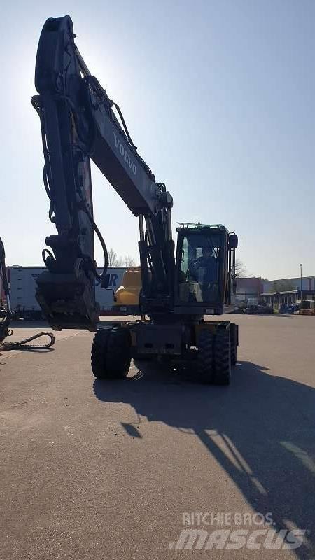 Volvo EW 210 C  휠 굴삭기