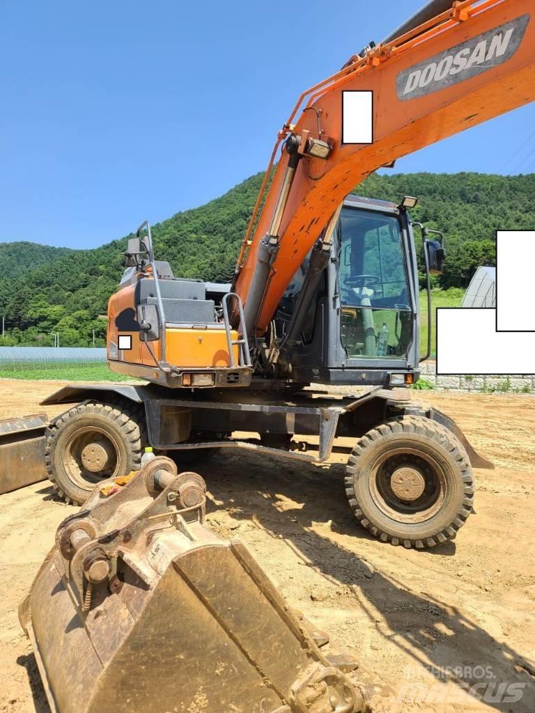 Doosan DX 140 W  휠 굴삭기