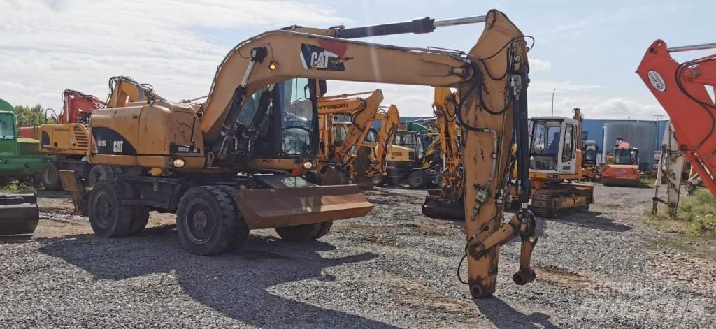 CAT M 315 D  휠 굴삭기