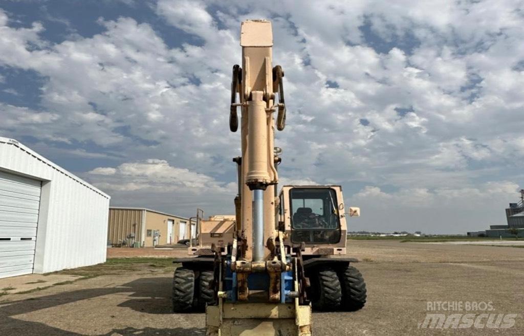 John Deere 595  휠 굴삭기