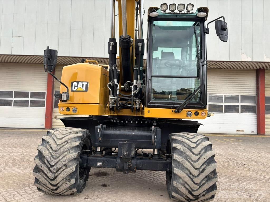 CAT M 318 F  휠 굴삭기