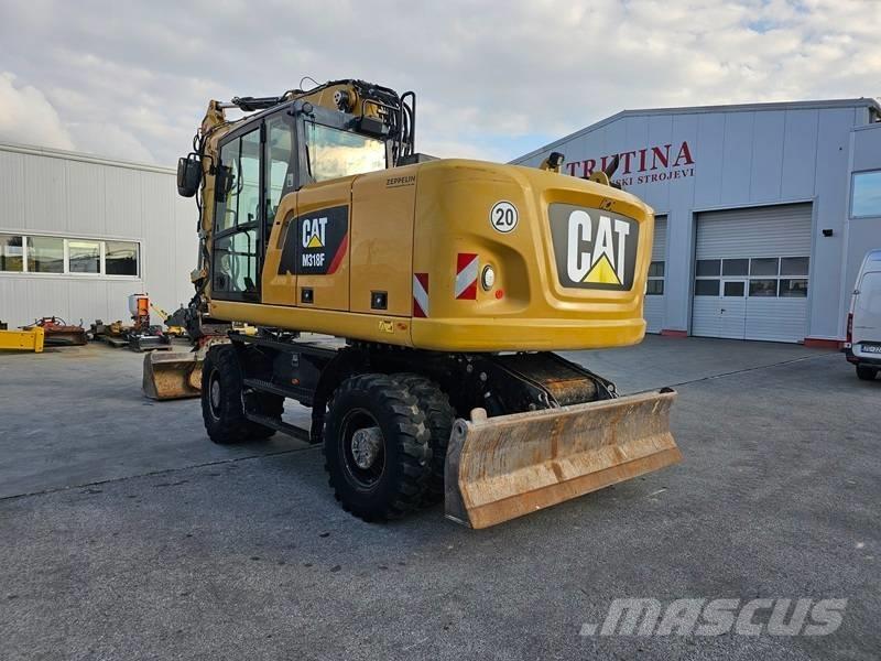 CAT M 318 F  휠 굴삭기