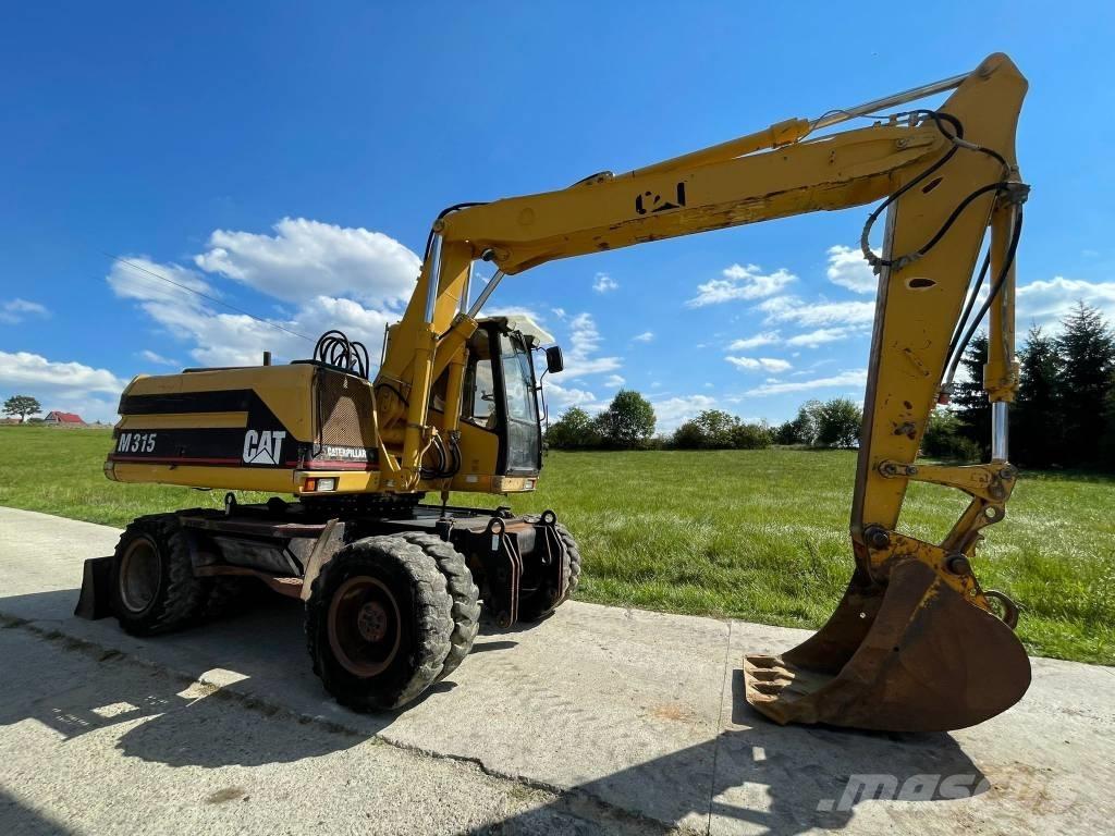 CAT M 315  휠 굴삭기