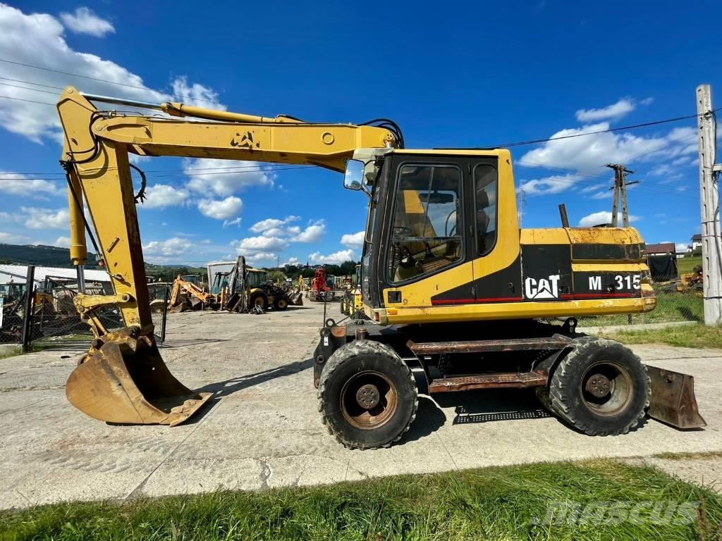CAT M 315  휠 굴삭기