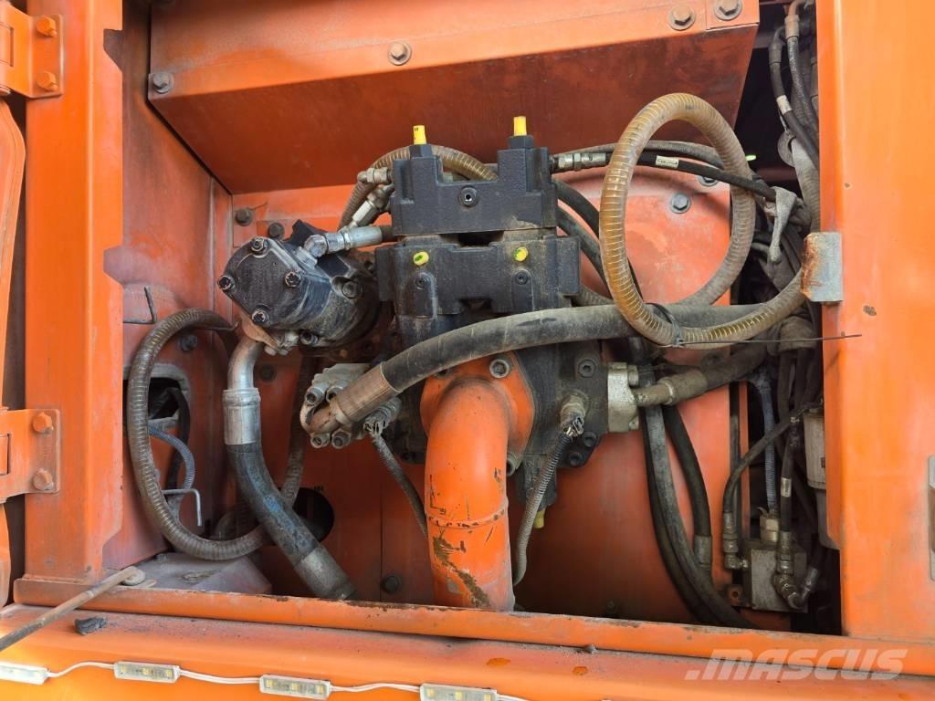 Doosan DX 210 W  휠 굴삭기