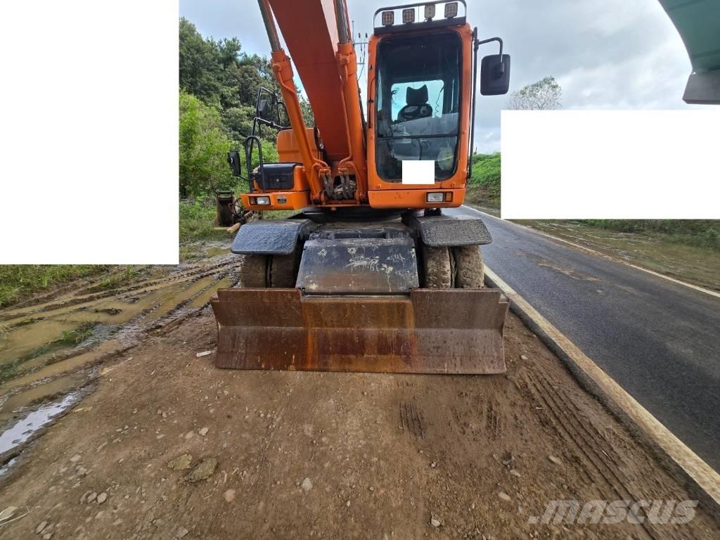 Doosan DX 210 W  휠 굴삭기