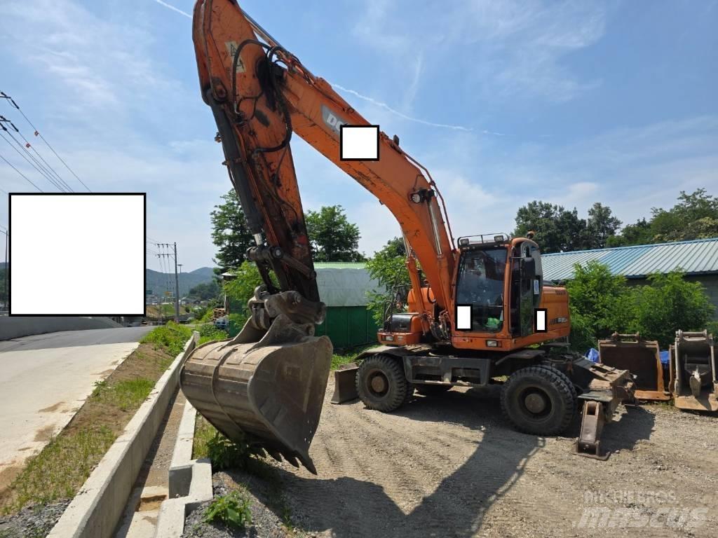 Doosan DX 210 W  휠 굴삭기