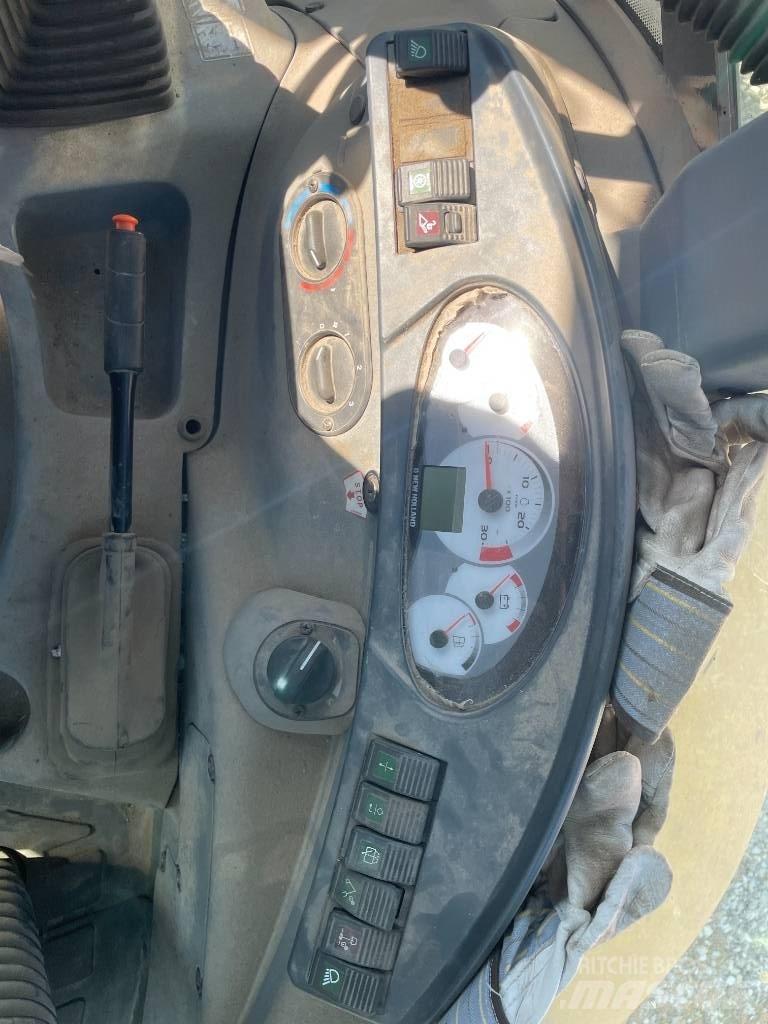 New Holland B 110 C 백호로더