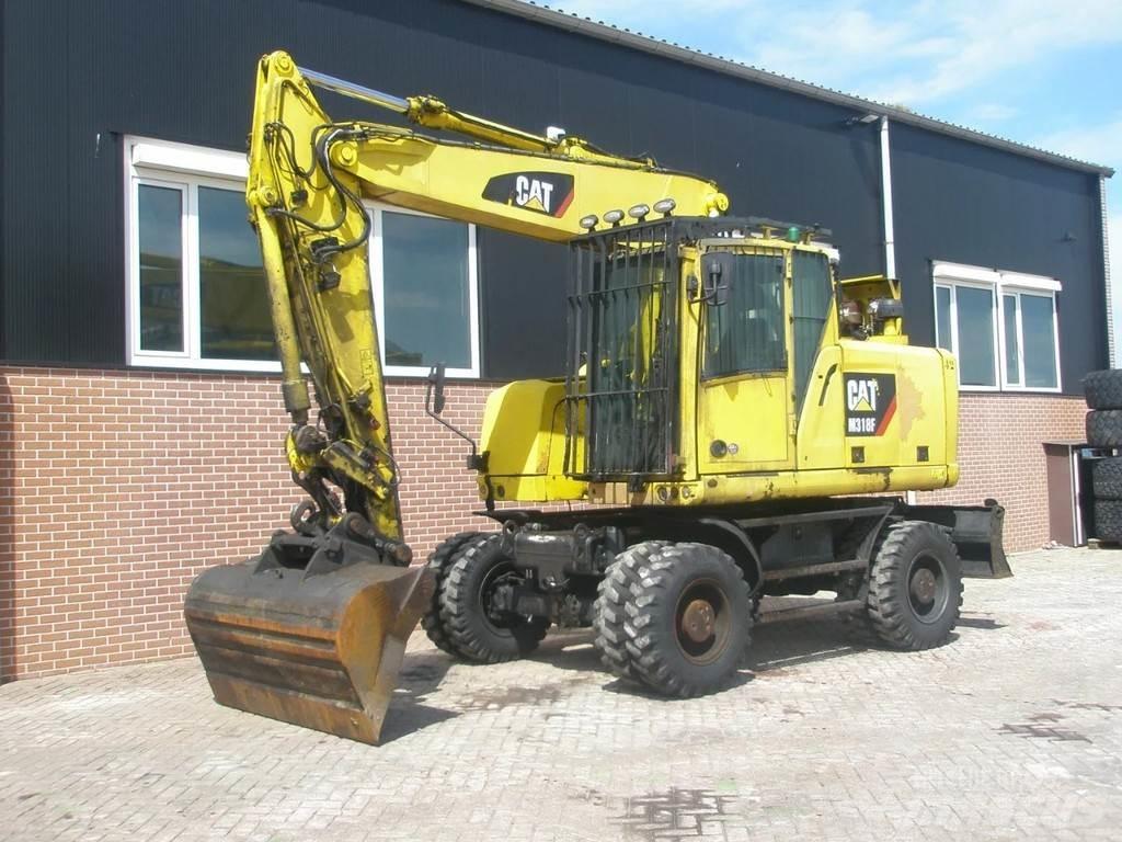 CAT M318F  휠 굴삭기