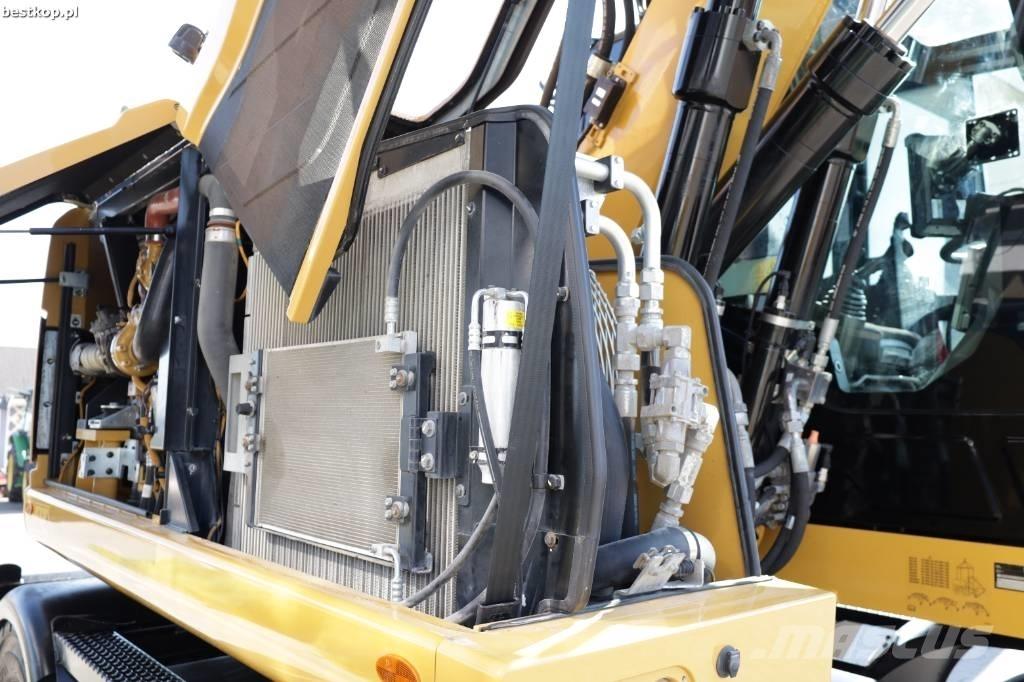 CAT M 315 F  휠 굴삭기