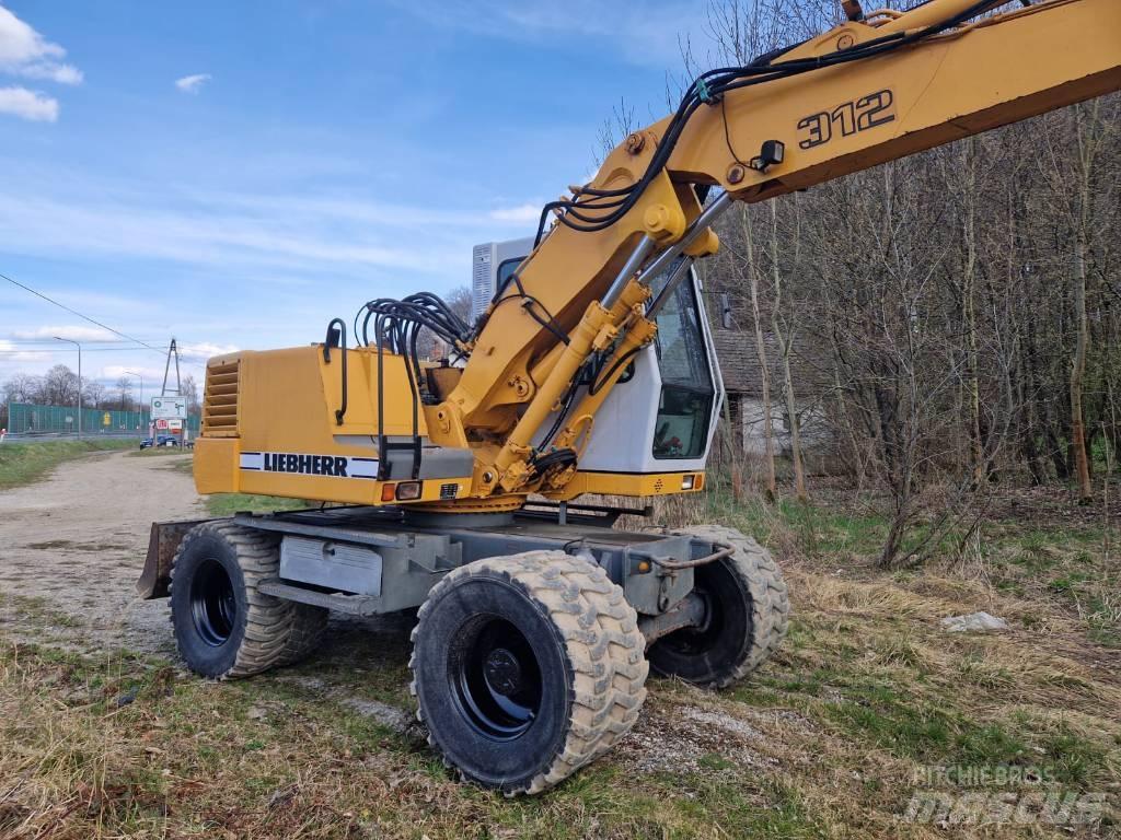 Liebherr 312 A  휠 굴삭기