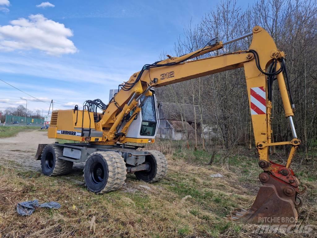 Liebherr 312 A  휠 굴삭기