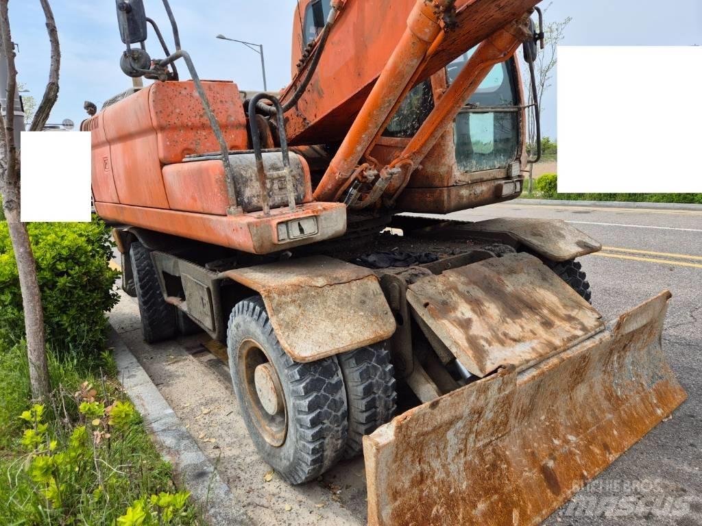 Doosan DX210WA  휠 굴삭기
