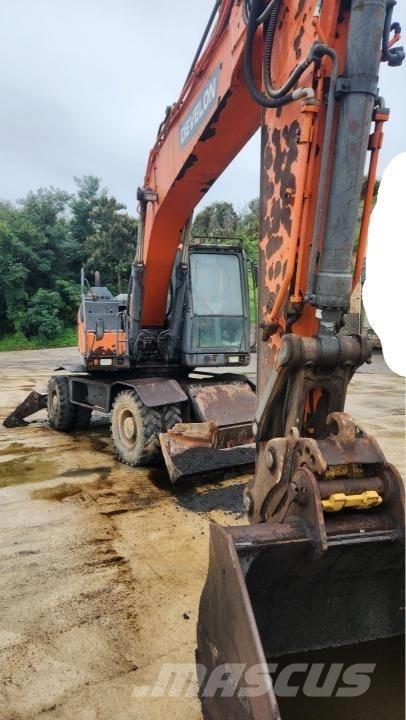 Doosan DX 210 W  휠 굴삭기