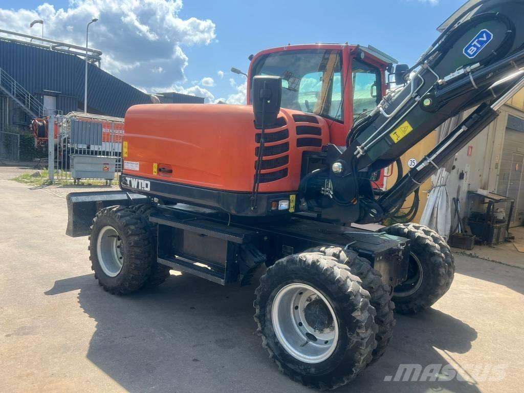 Schaeff TW 110  휠 굴삭기