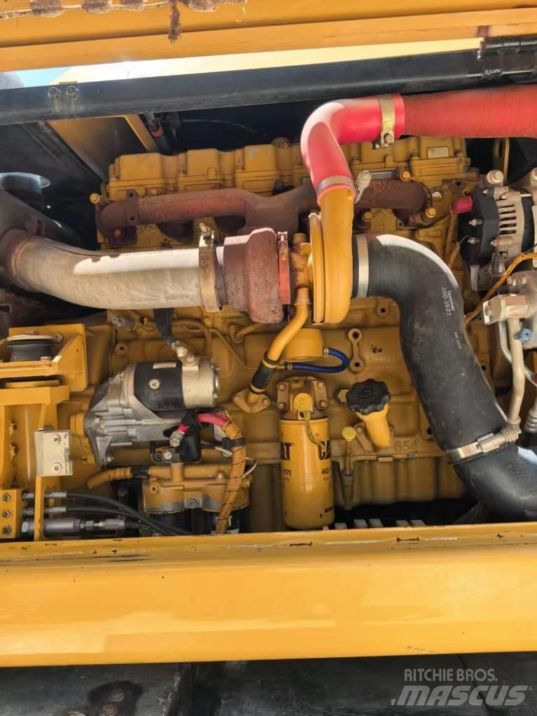 CAT M 320  휠 굴삭기