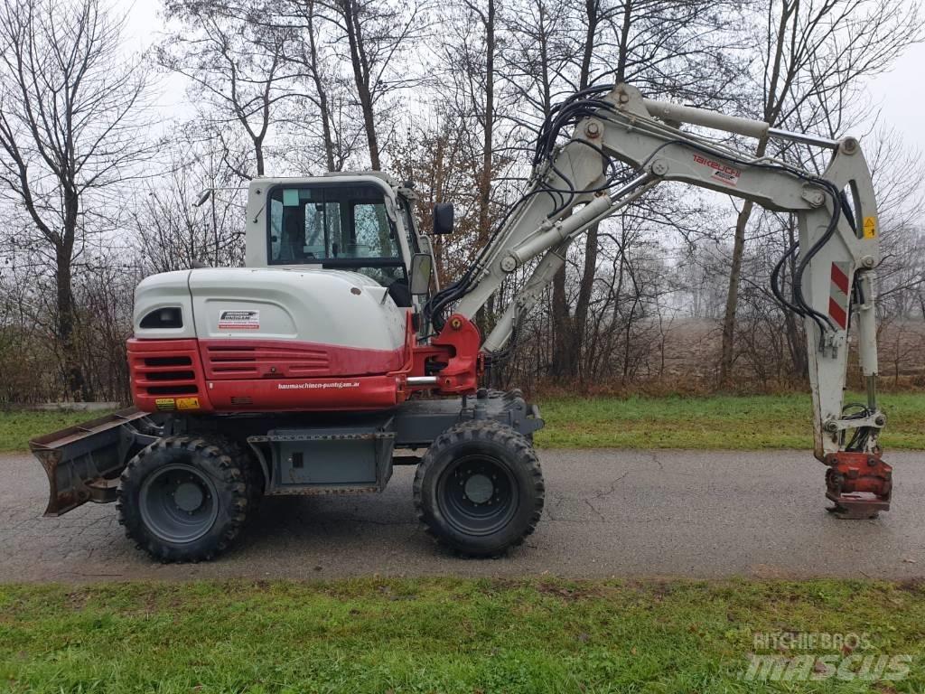 Takeuchi TB 295 W  휠 굴삭기