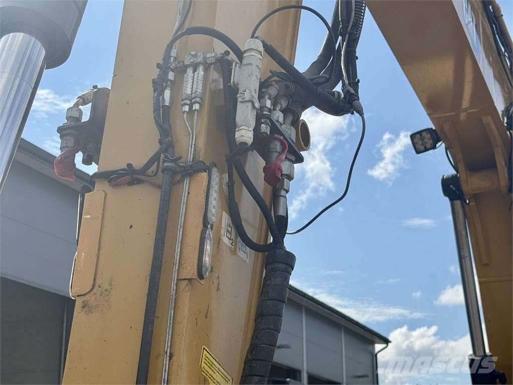CAT 310 중형굴삭기 7톤-28톤