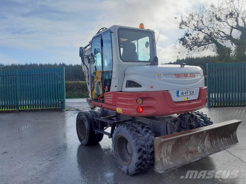 Takeuchi TB 295 W  휠 굴삭기