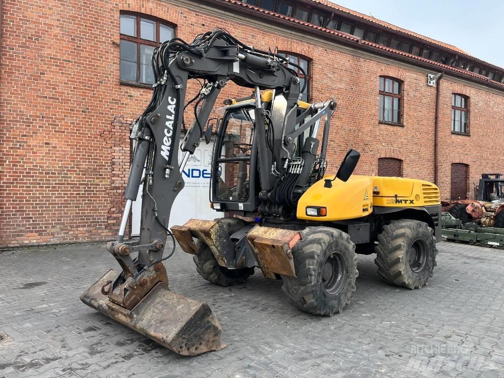 Mecalac 12 M TX  휠 굴삭기