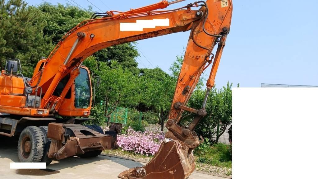 Doosan DX 210 W  휠 굴삭기