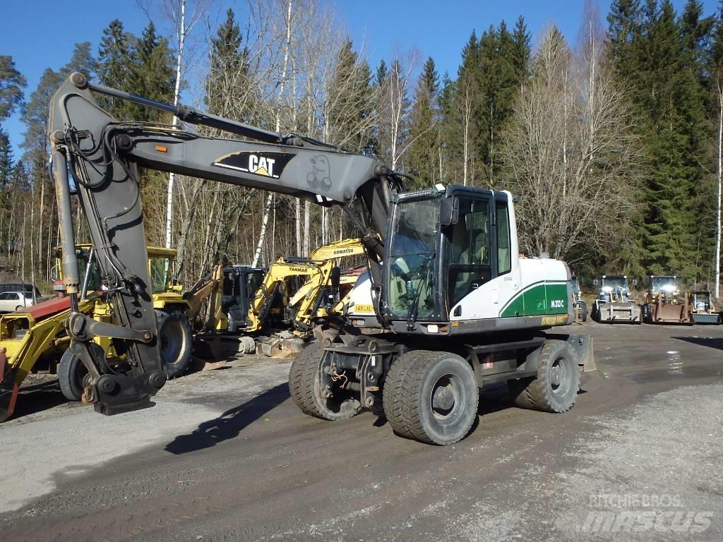 CAT M 313 C 4x4  휠 굴삭기