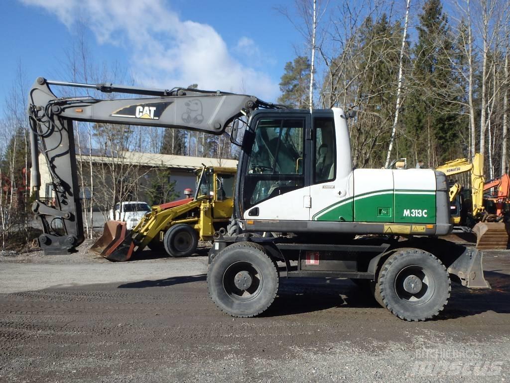 CAT M 313 C 4x4  휠 굴삭기