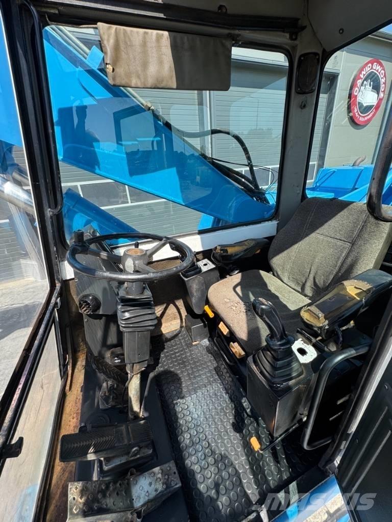 Fuchs MHL 331 폐기물/산업 처리기