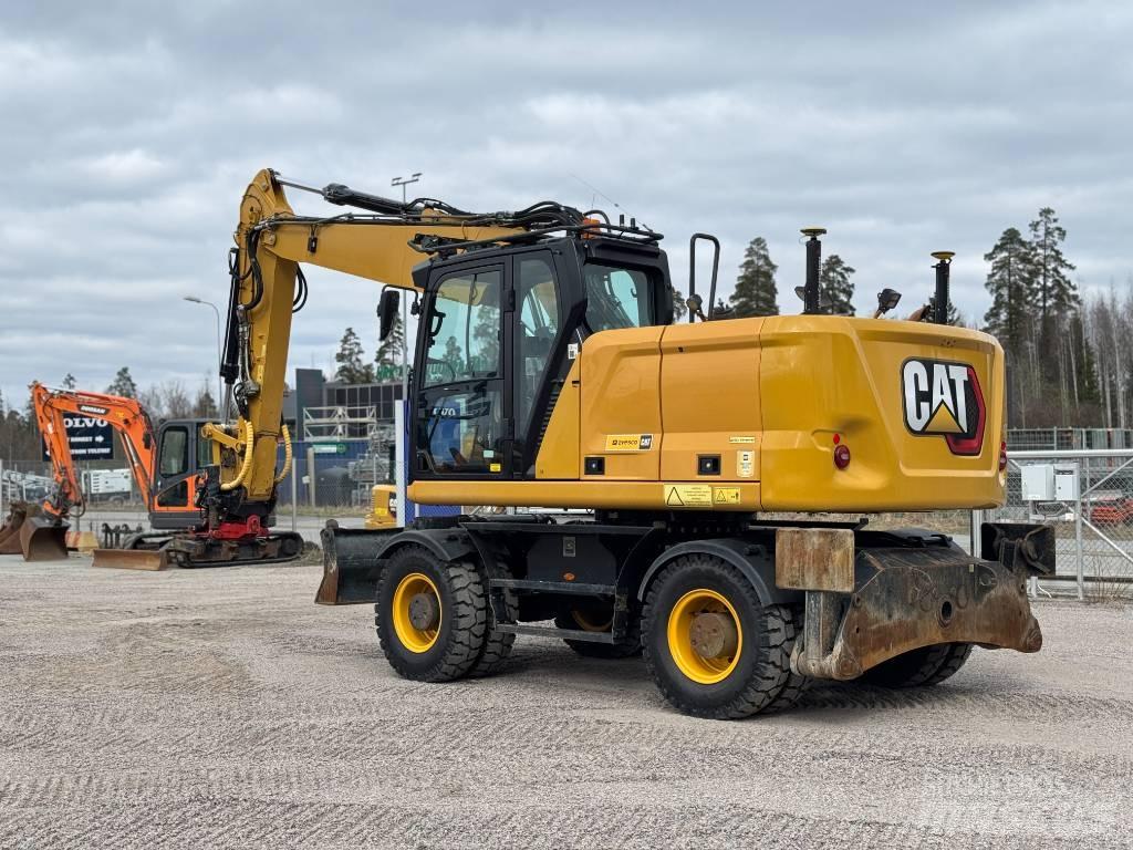 CAT M 318  휠 굴삭기