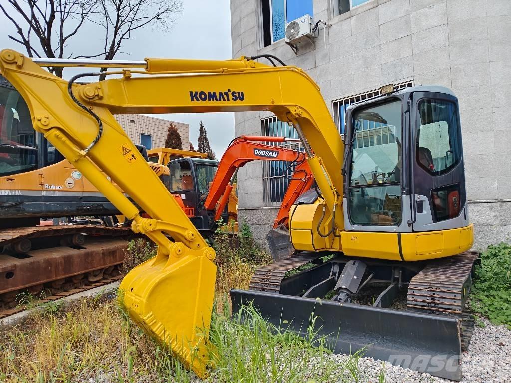 Komatsu PC 78 US 중형굴삭기 7톤-28톤