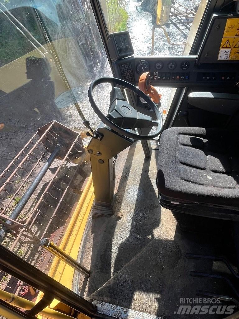 New Holland TC 56 H 콤바인 수확기