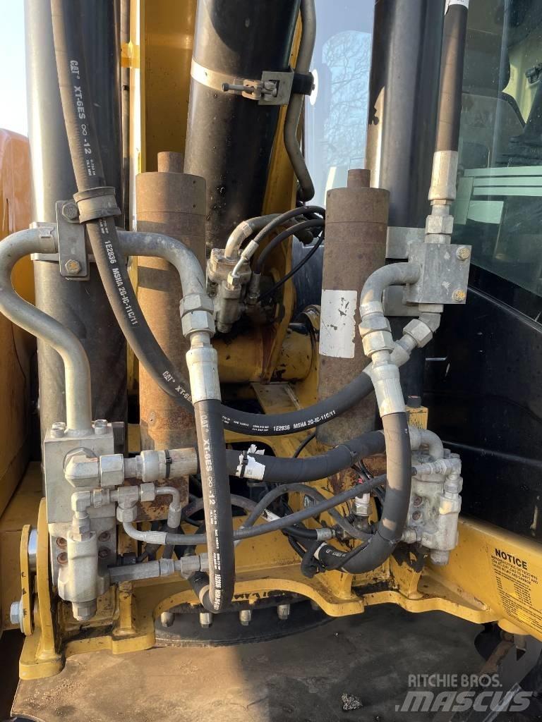 CAT M 313 D  휠 굴삭기