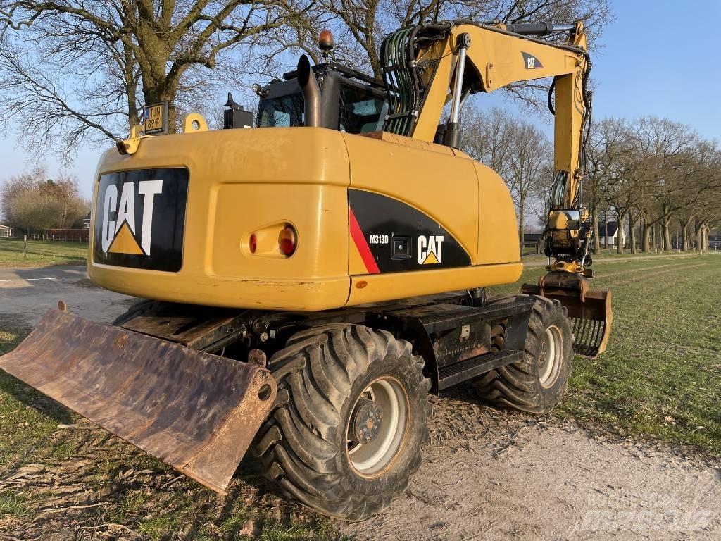 CAT M 313 D  휠 굴삭기