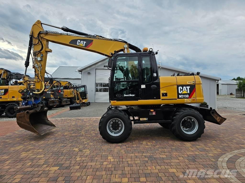 CAT M 313 D  휠 굴삭기