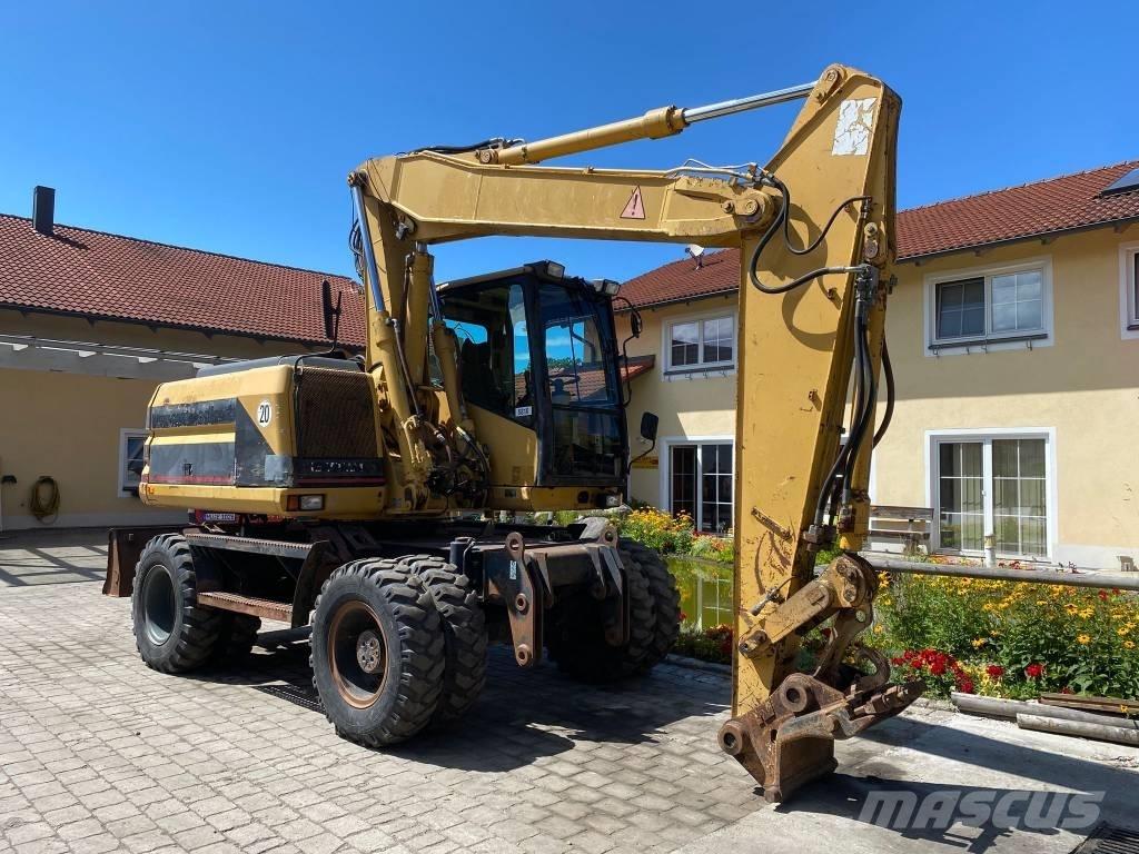 CAT M 312  휠 굴삭기