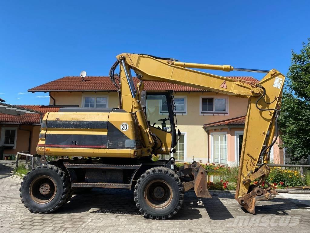 CAT M 312  휠 굴삭기