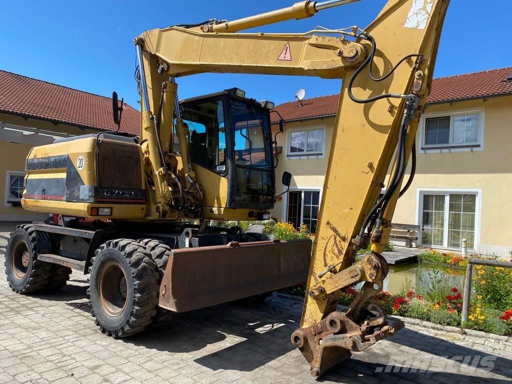 CAT M 312  휠 굴삭기
