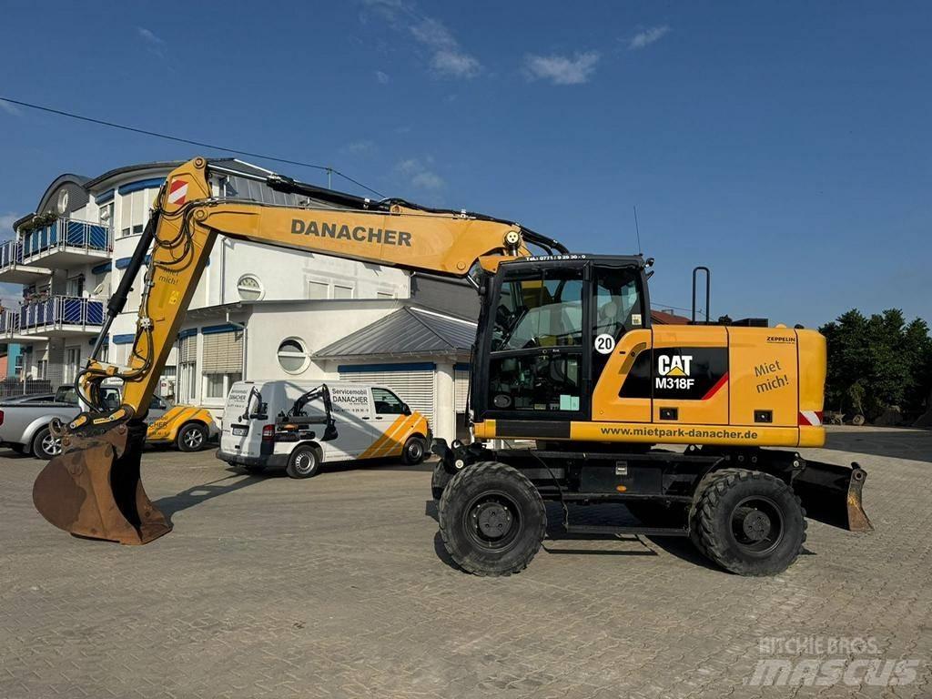 CAT M 318 F  휠 굴삭기