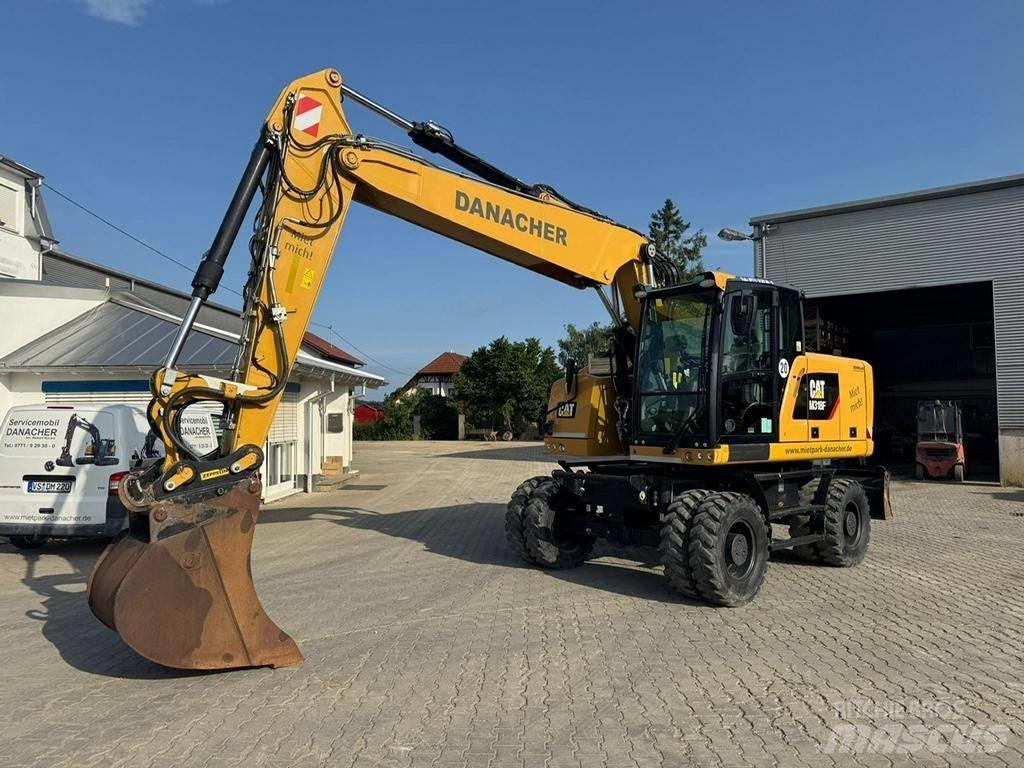 CAT M 318 F  휠 굴삭기