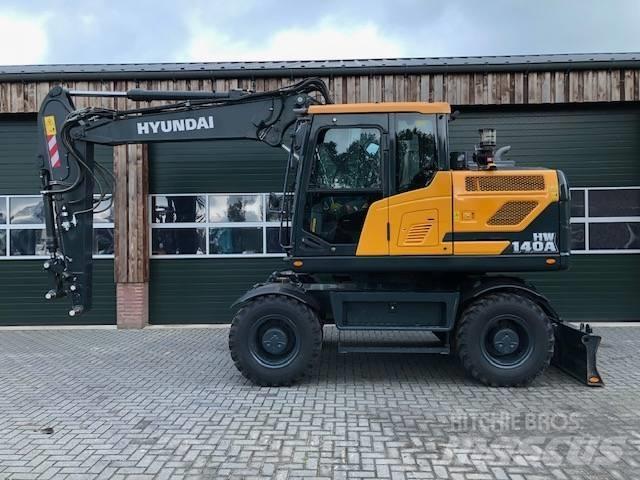 Hyundai HW140A  휠 굴삭기