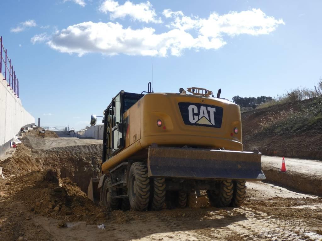 CAT M 318 F  휠 굴삭기