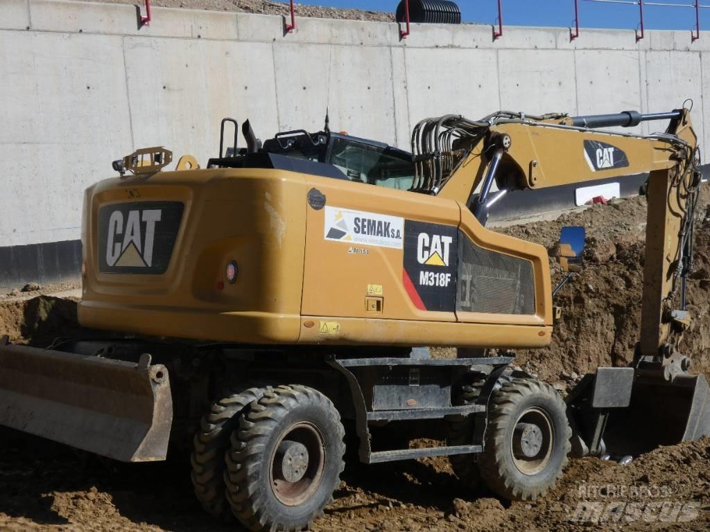 CAT M 318 F  휠 굴삭기