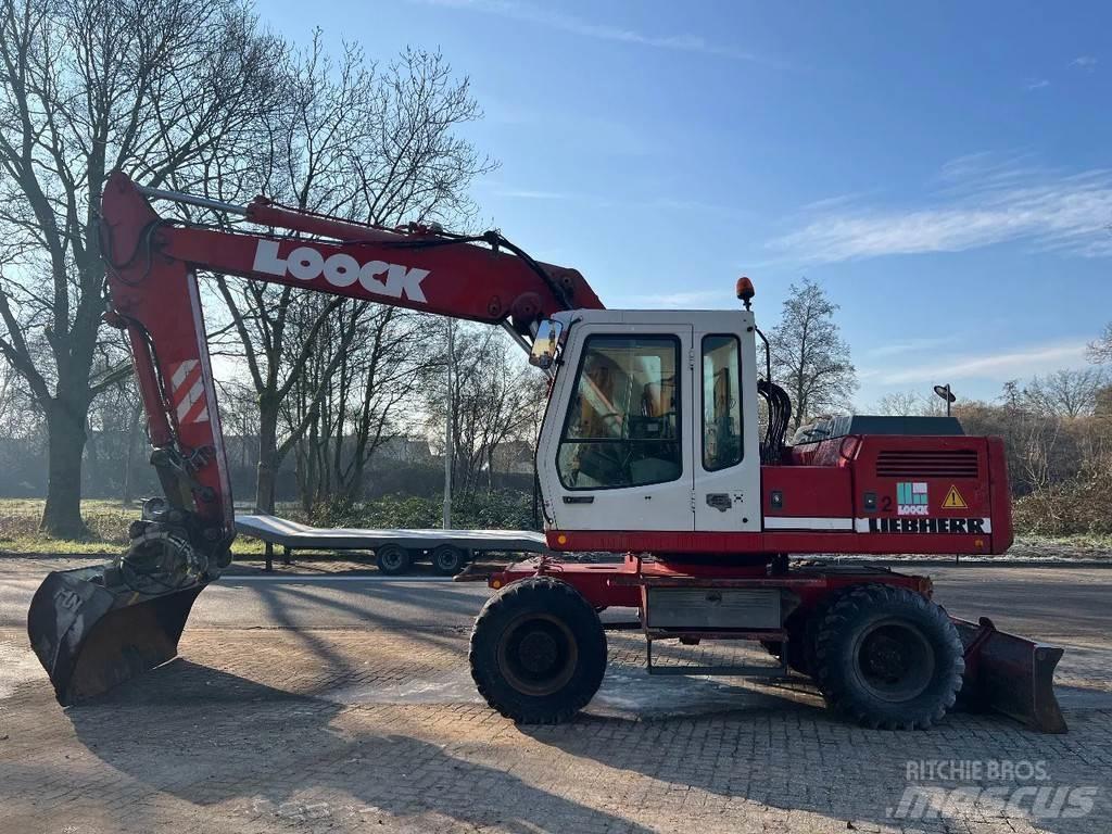 Liebherr 902  휠 굴삭기