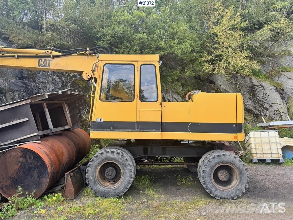 CAT 212B  휠 굴삭기