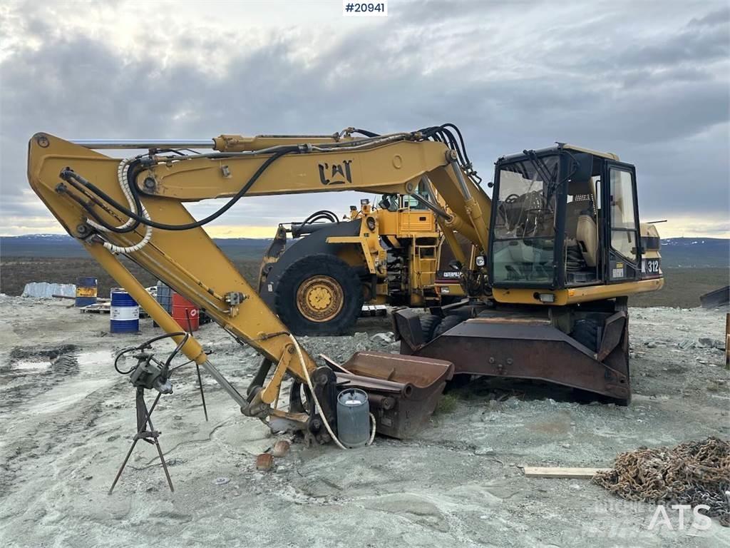 CAT 312  휠 굴삭기