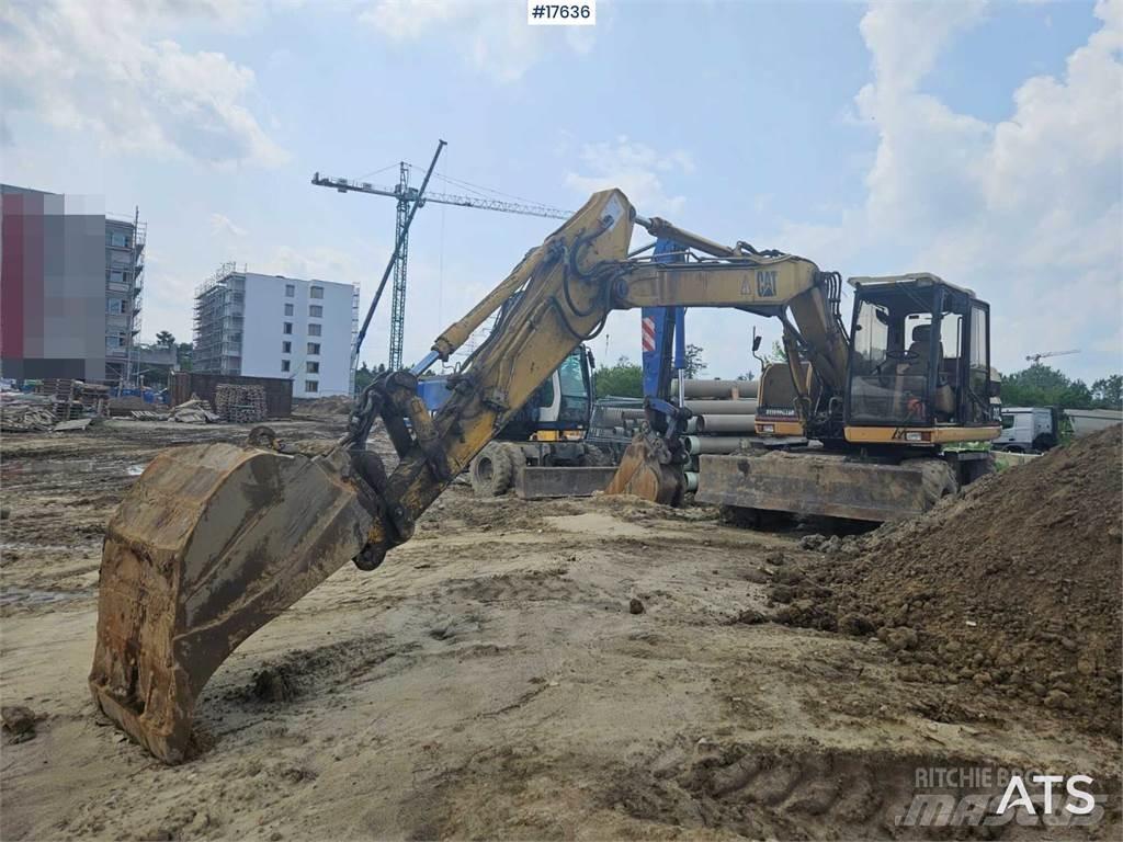 CAT M312  휠 굴삭기
