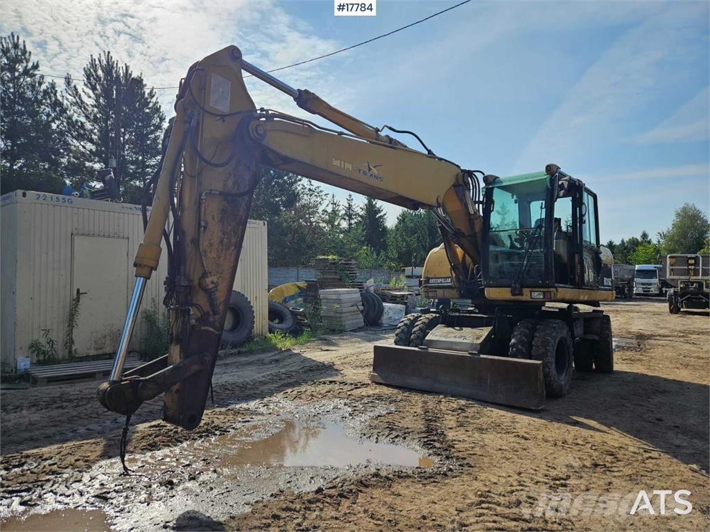 CAT M316C  휠 굴삭기