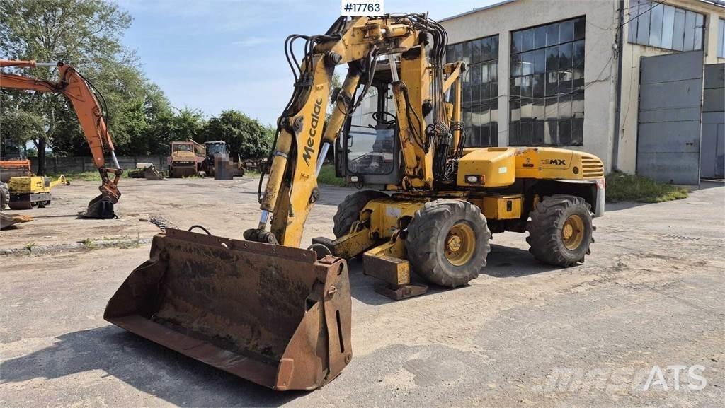 Mecalac 12MX  휠 굴삭기