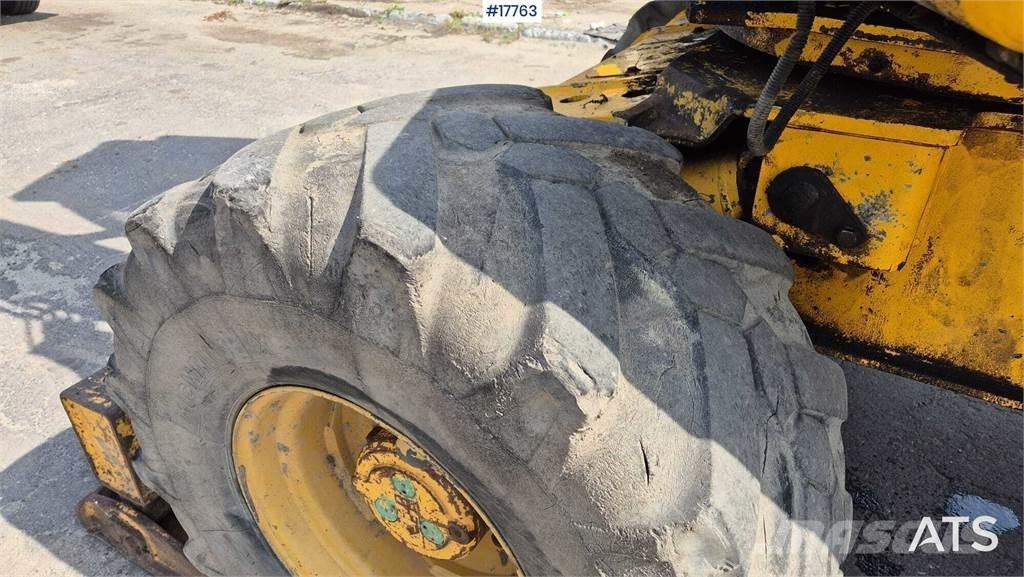 Mecalac 12MX  휠 굴삭기