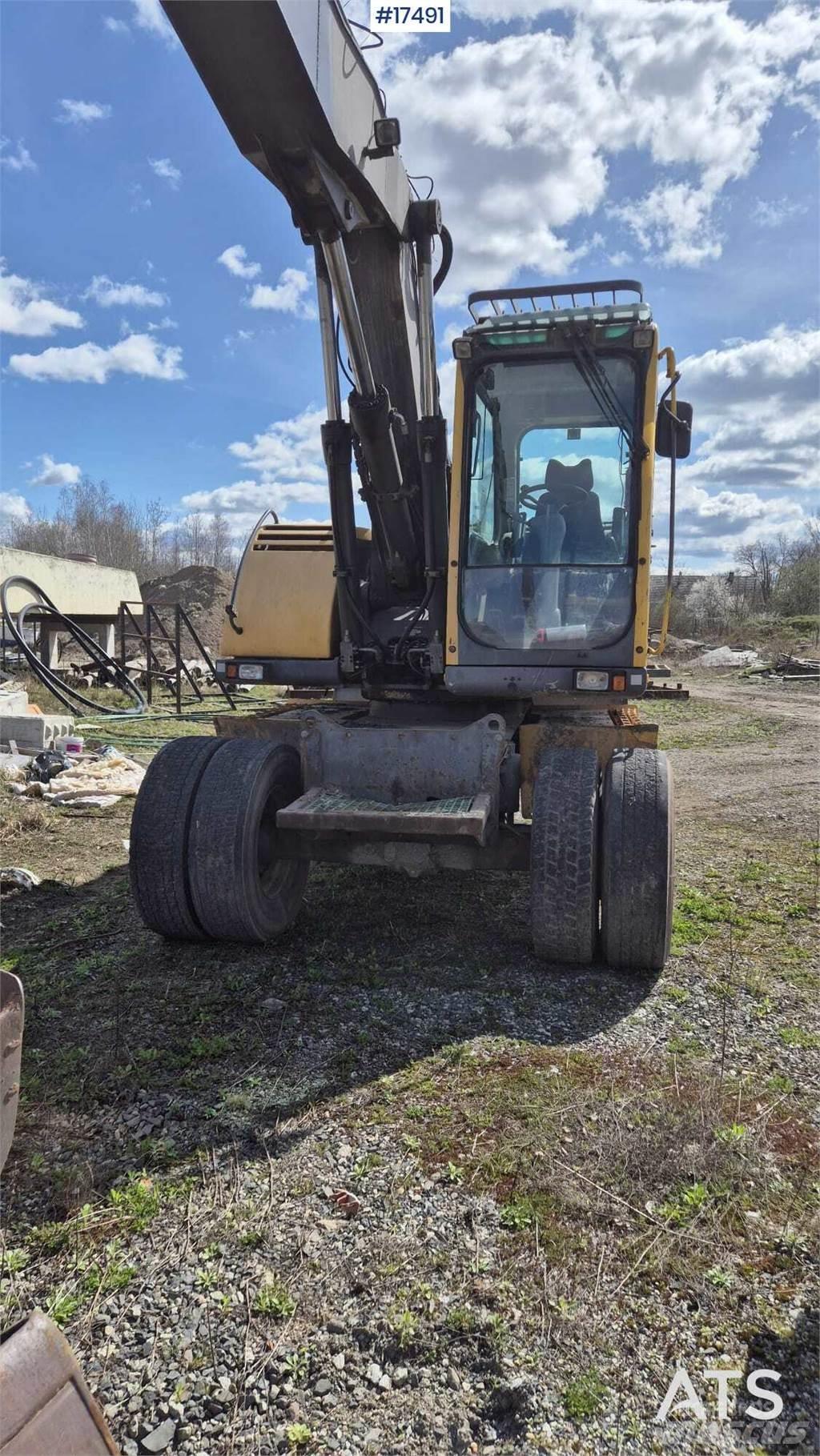 Volvo EW160B  휠 굴삭기